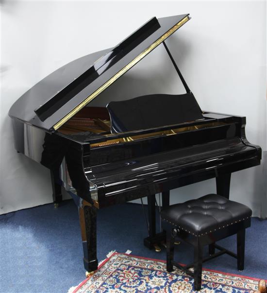 A Yamaha C3 Conservatory grand piano, signed by Danny Grimwood and Robin Howard, W.4ft 9in. D.5ft 11in. H. 3ft 4in.